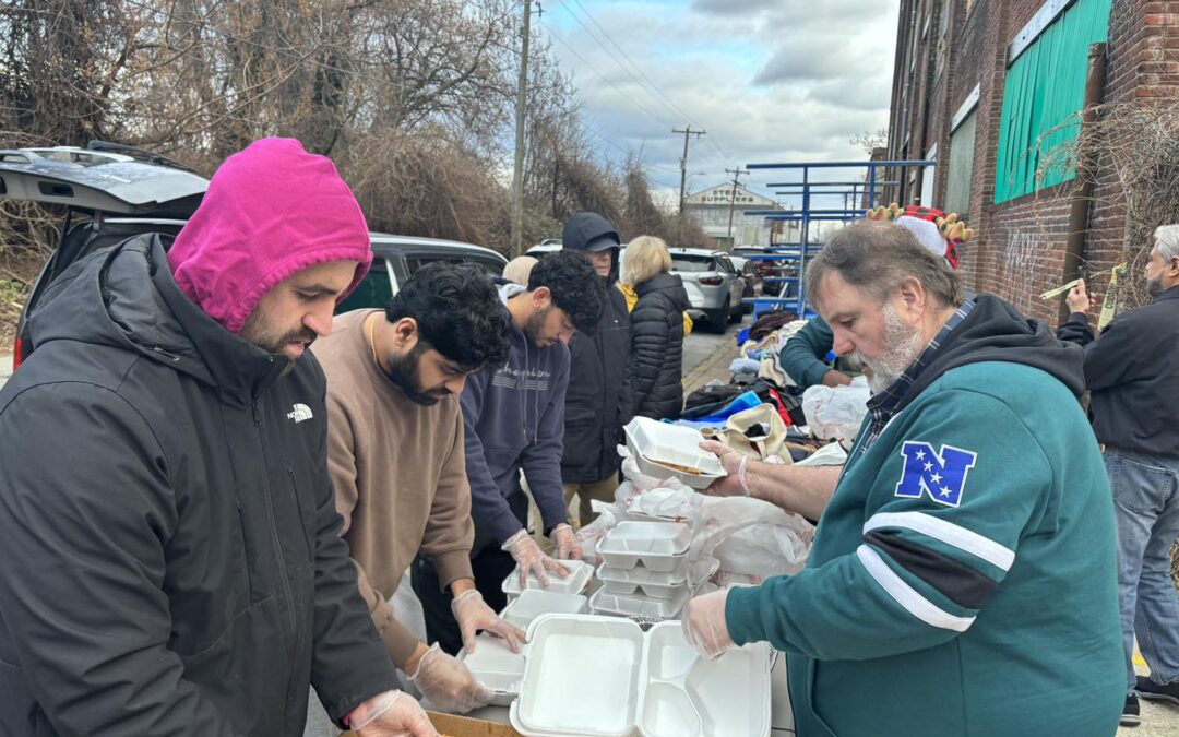 Volunteers from different faith groups at the monthly food service today in Wilmington. – December 30, 2023