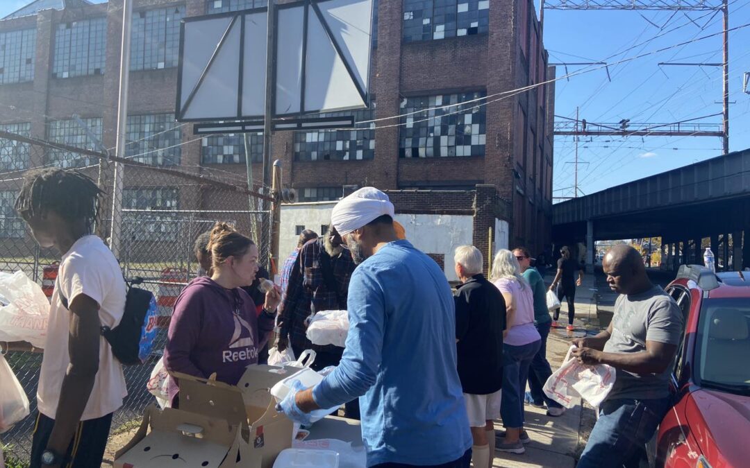 Volunteers from different faith groups at the monthly food service today in Wilmington. – October 28, 2023